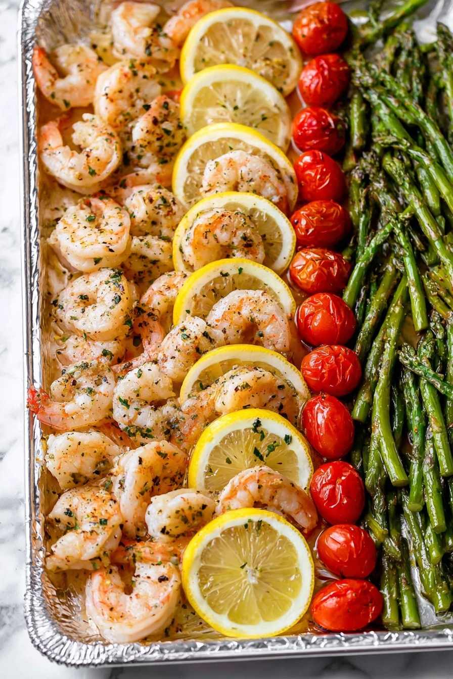The image shows a large silver baking tray lined with shiny foil, filled with cooked shrimp placed over thin yellow lemon slices, all sprinkled with green herbs and spices. On the right side, there are bright red cherry tomatoes and dark green asparagus spears. A wooden spatula is gently lifting some shrimp along with a cherry tomato and asparagus, all set on a white marbled texture surface. The colors are vibrant with the pink shrimp, yellow lemon, red tomatoes, and green asparagus clearly visible. photo taken with an iphone --ar 2:3 --v 7