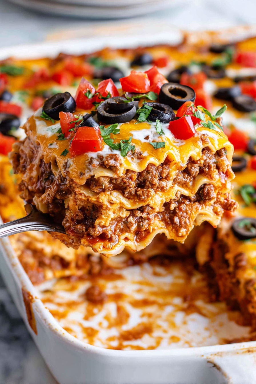 A large square piece of lasagna is lifted by a spoon above a white baking dish with visible sauce stains. The lasagna has multiple layers including a bottom layer of light-colored wavy pasta sheets, several layers of brown meat sauce mixed with creamy white cheese, and melted orange cheese on top. The top layer is decorated with black olive slices, small red diced tomatoes, and green chopped herbs, creating a colorful and textured surface. The background shows the rest of the lasagna in the baking dish, placed on a white marbled surface. Photo taken with an iphone --ar 2:3 --v 7