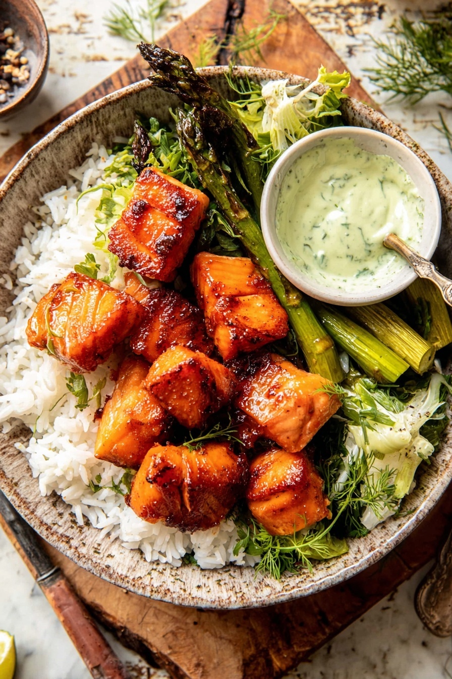 A transparent glass bowl filled with many small brown crispy cubes of cooked meat, evenly browned with a slightly charred texture. Above the bowl, a metal pot is tilting as a light yellow oily sauce is pouring down onto the meat cubes. The bowl is set on a white marbled surface, showing a contrast between the warm brown meat and the cool white background. Photo taken with an iphone --ar 2:3 --v 7