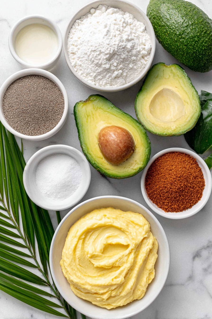 Flat lay of one large ripe but slightly firm avocado cut in half with pit visible, a small white ceramic bowl of all-purpose flour, a small white ceramic bowl of garlic powder, a small white ceramic bowl of fine sea salt, a small white ceramic bowl of black pepper, a small white ceramic bowl of plain unsweetened non-dairy milk, a small white ceramic bowl heaped with panko breadcrumbs, a small white ceramic bowl filled with creamy vegan chipotle mayo, and a small spray of fresh green avocado leaves arranged symmetrically, placed on a clean white marble surface, soft natural light, photo taken with an iPhone, professional food photography style, fresh ingredients, white ceramic bowls, no bottles, no duplicates, no utensils, no packaging --ar 2:3 --v 7 --p m7354615311229779997